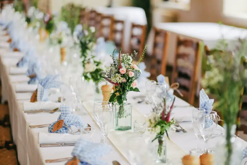 Garden reception table with blue linens